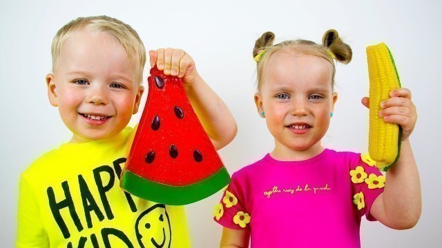 'Real Food VS Gummy Food Challenge. Gaby and Alex Tasting Giant Sweets'