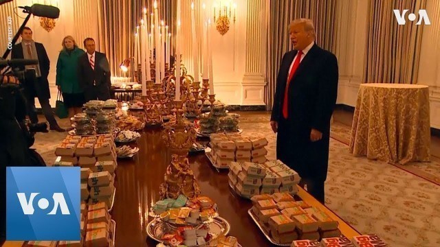 'Trump Serves Burger, Fries, Pizza to Clemson Tigers at White House'