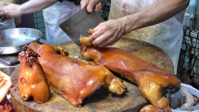 'Hong Kong Street Food. Chopping Piglets, Ducks, Pigeons, Chickens in Sham Shui Po'