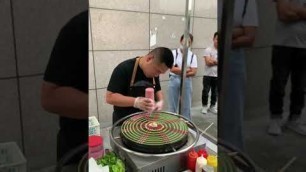 '煎饼果子 Chinese crêpe #shorts #streetfood #china #pancake'