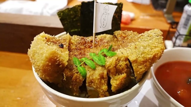 'This is probably the best katsudon in Osaka. Japanese street food.'