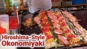 '【Japanese street food】Okonomiyaki is a famous staple at Japanese festivals and food stalls!'