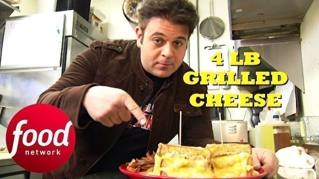 'Adam Finds Out How Much Dairy His Body Can Take After Trying The 4 LB Grilled Cheese | Man v Food'