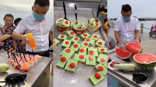 'Street Food In China : Fruit Ice Cream Fried With Cherry / Sweet ice cream / Ice Cream Roll'