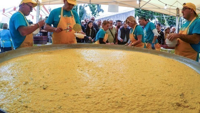 'HUGE Pan of Rice with Blue Cheese. Italian Street Food Festival of Gorgonzola Cheese'