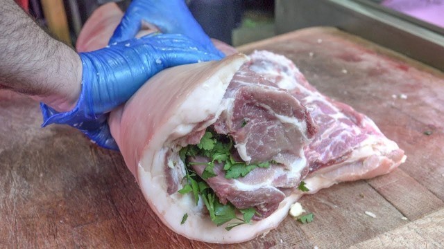 'Stuffed Fat Pork Belly the Italian Way. Preparing \"Porchetta\". London Street Food'