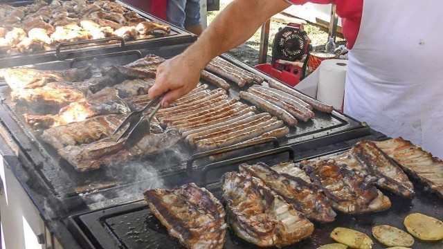 'Italy Street Food. Huge Grills Overloaded with Ribs, Sausages and More Meat. Pepero Festival'