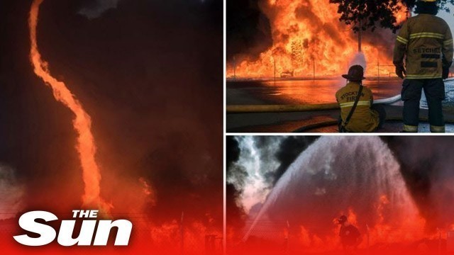 'Firefighters battle massive ‘fire tornado’ after blaze breaks out at food processing plant'