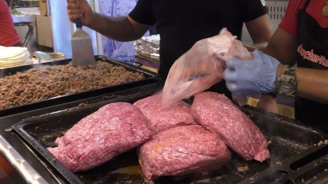 'Mexico Street Food. Cooking Meat for Tacos and Burritos. Italy Street Food Festival'