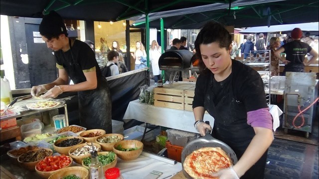 'Fresh made Hand Stretched Vegan Pizza: Yummy Italian Street Food by \"Plant Powered Pizza\" in London.'