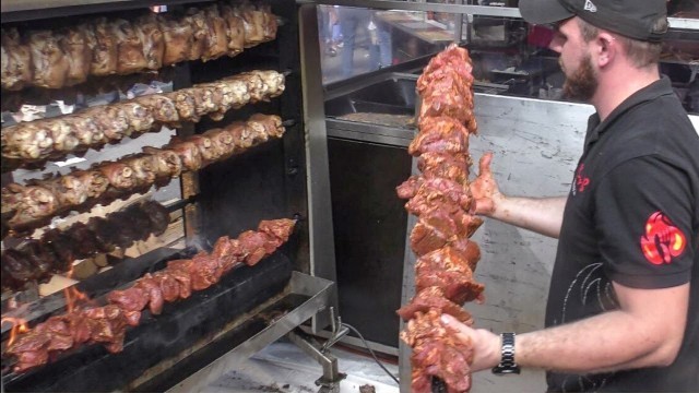 'Germany Street Food. Huge Pork Legs Skewers, Ribs and More. Italy Street Food Festival'