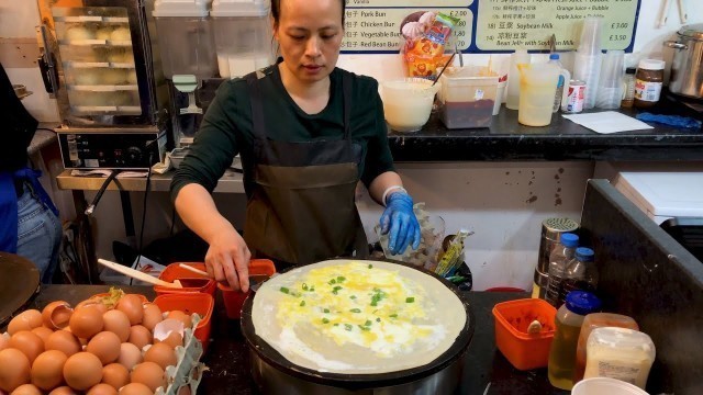 'Have you seen this Chinese Street Food? Jianbing! 煎饼果子来一套!'