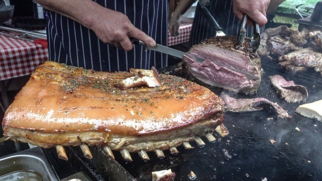 'Argentina Street Food. Huge Blocks of Meat on Grill. London'