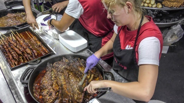 'Huge Sausages, Ribs and Skewers from Poland. Italy Street Food Fair'