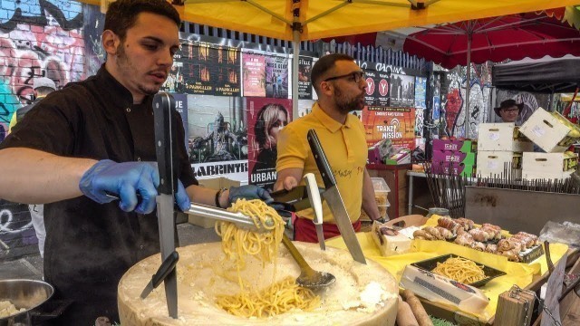 'Italian Soft Fresh Spaghetti Savoured in a Cheese Wheel. London Street Food'