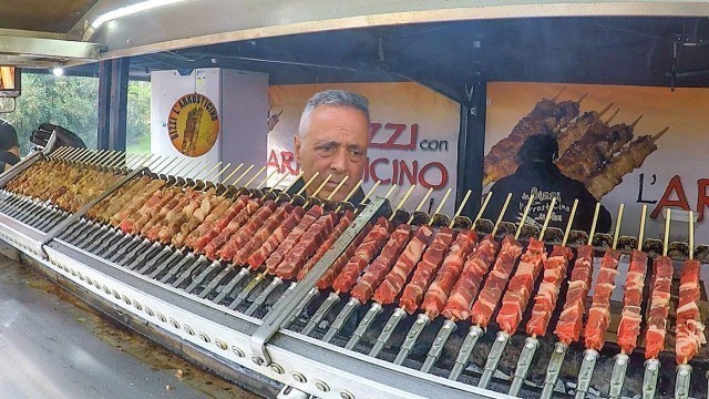 'Huge Automatic Machines Grilling Lots of Lamb Skewers. Italy Street Food'