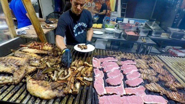 'Argentina Street Food. Huge Grills Roasting Ribs, Sausages, Asado and more Meat. Italian Fairs'