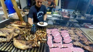 'Argentina Street Food. Huge Grills Roasting Ribs, Sausages, Asado and more Meat. Italian Fairs'