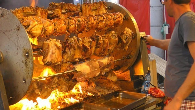 'International Street Food Event in Italy. Huge Rotisserie, Grills of Meat, Seafood. Street Food'