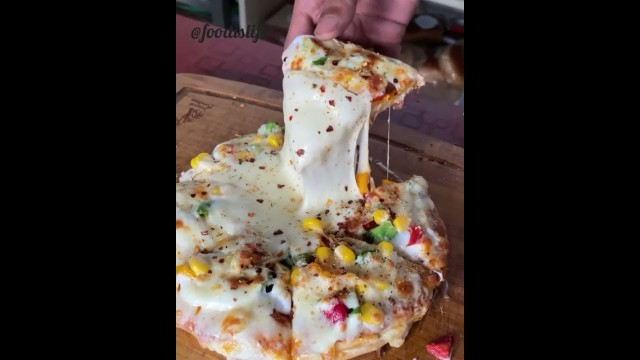 'chezz loaded pizza/street food india/#streetfood #crazyfood #chezziestpizzaever#shots'